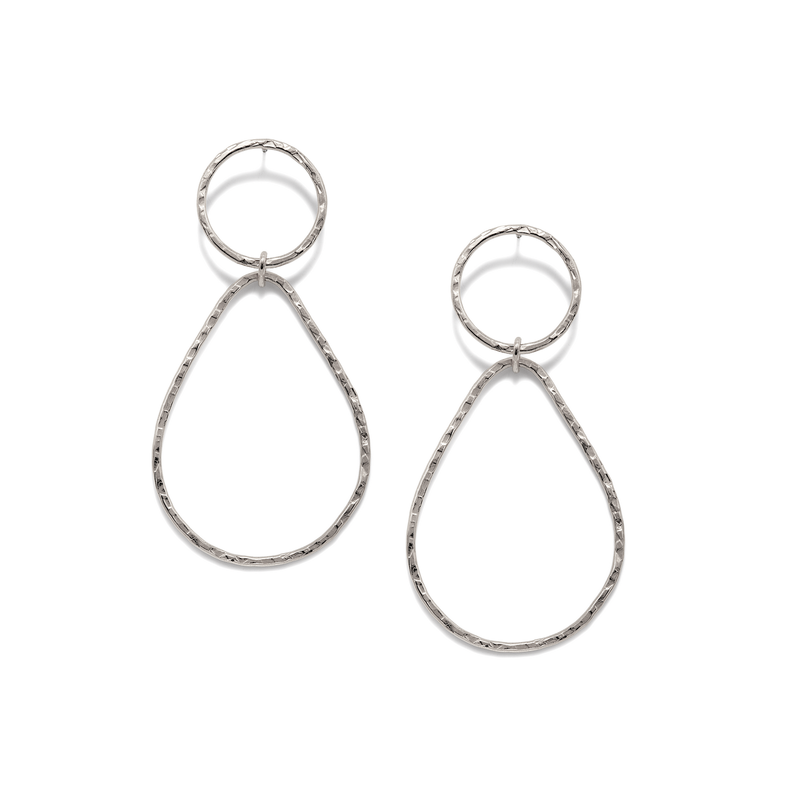 The Silver Textured Tear Post Earrings by JAREDJAMIN Jewelry Online feature a small, textured silver hoop atop a larger, hammered pear-shaped dangle for a handcrafted look, displayed on a white background.