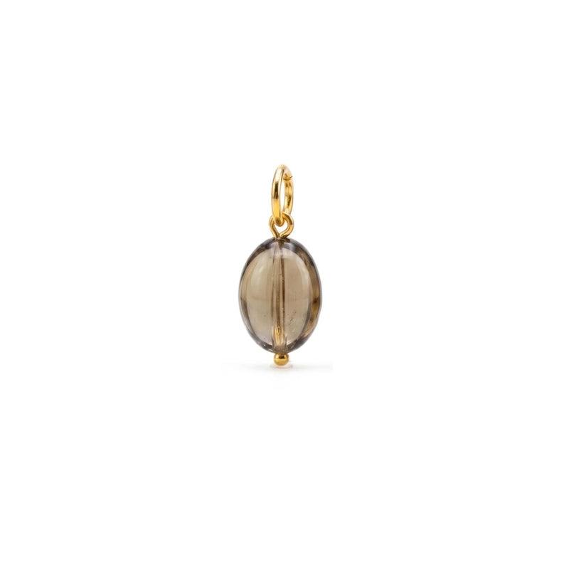 A smoky quartz pebble, hand-assembled in our West Hollywood studio, refracts soft light beside its 18k gold-accented bail. Crafted in small batches with eco-conscious intent. Style Note: punctuates both tailored shirting and sleek evening knits. Shown on white.