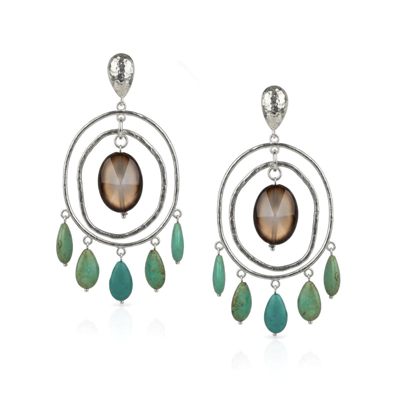 Studio product shot of the pair of 4-inch, 22-gram JAREDJAMIN Sonora Silver Agate & Turquoise Howlite Chandelier Drop Post Earrings displayed flat against a white background, showing the double concentric silver rings, central agate stone, five howlite charms, and hammered teardrop post tops.