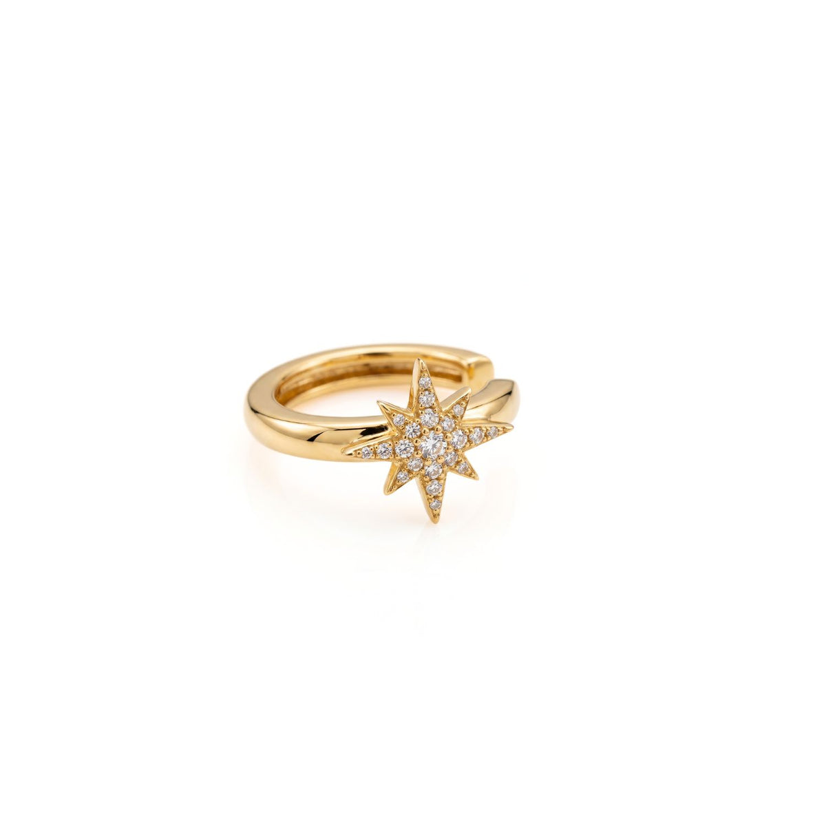 High-resolution studio product shot of the gold-plated JAREDJAMIN Astra Star Pavé Ear Cuff against a white background, highlighting the polished band and the clear CZ-set 8-point star centerpiece.