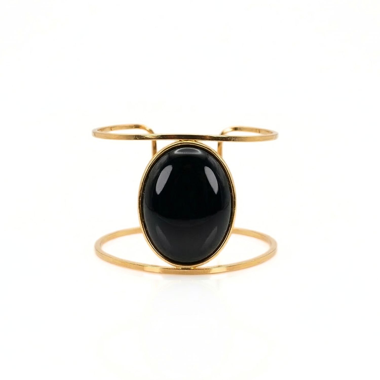 The Jared Jamin Stella Cuff in Black Onyx, showcasing the slim 18K gold-plated hammered band and the deep black gemstone accent.