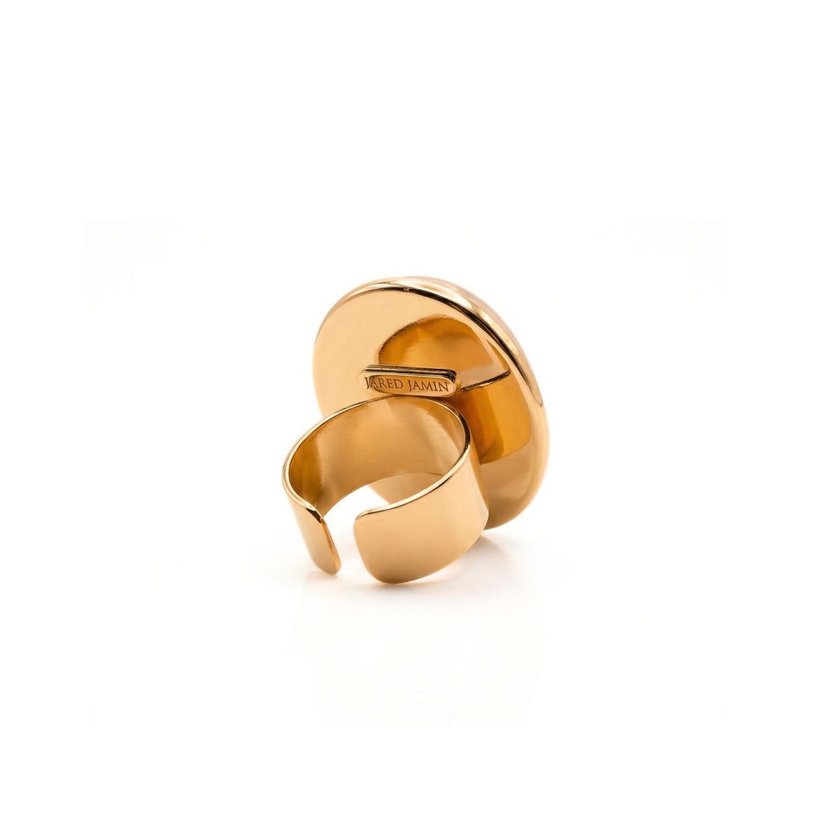Hand-assembled in our West Hollywood studio, the Stella Statement Ring sculpts eco-conscious luxury from 18k gold-plated curves and a luminous rose quartz oval. Small-batch, mindful origin. Style Note: punctuates tailored looks or slips into after-dark layers.