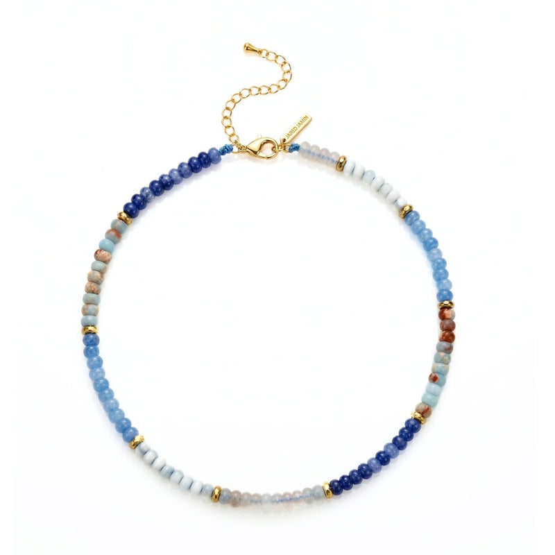 Hand-assembled in our West Hollywood studio, the Taylor Beaded Necklace Blue layers nuanced blue, light brown, white, and gold beads—punctuated by gold spacers—on an adjustable eco-conscious chain. Style Note: Bridges sharp tailoring and after-dark ease.