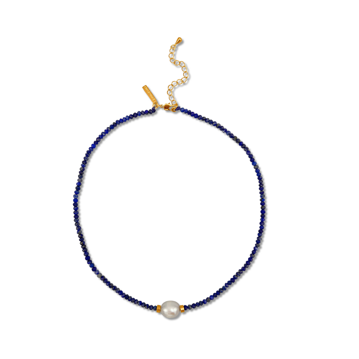 The Rowan Necklace Lapis Lazuli by JAREDJAMIN Jewelry Online features deep blue lapis beads, a large freshwater pearl flanked by gold spacers, and a gold adjustable clasp—an elegant layering piece for any look.
