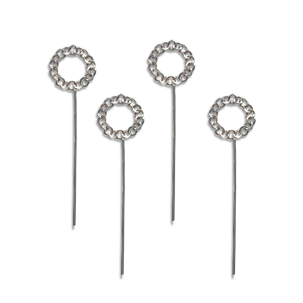 A set of four Silver Unity Cocktail Skewers by JAREDJAMIN Barware and More, featuring decorative looped tops with a chain-like design, is elegantly arranged on a plain white background. Ideal for enhancing your charcuterie board with both style and intricate detail.