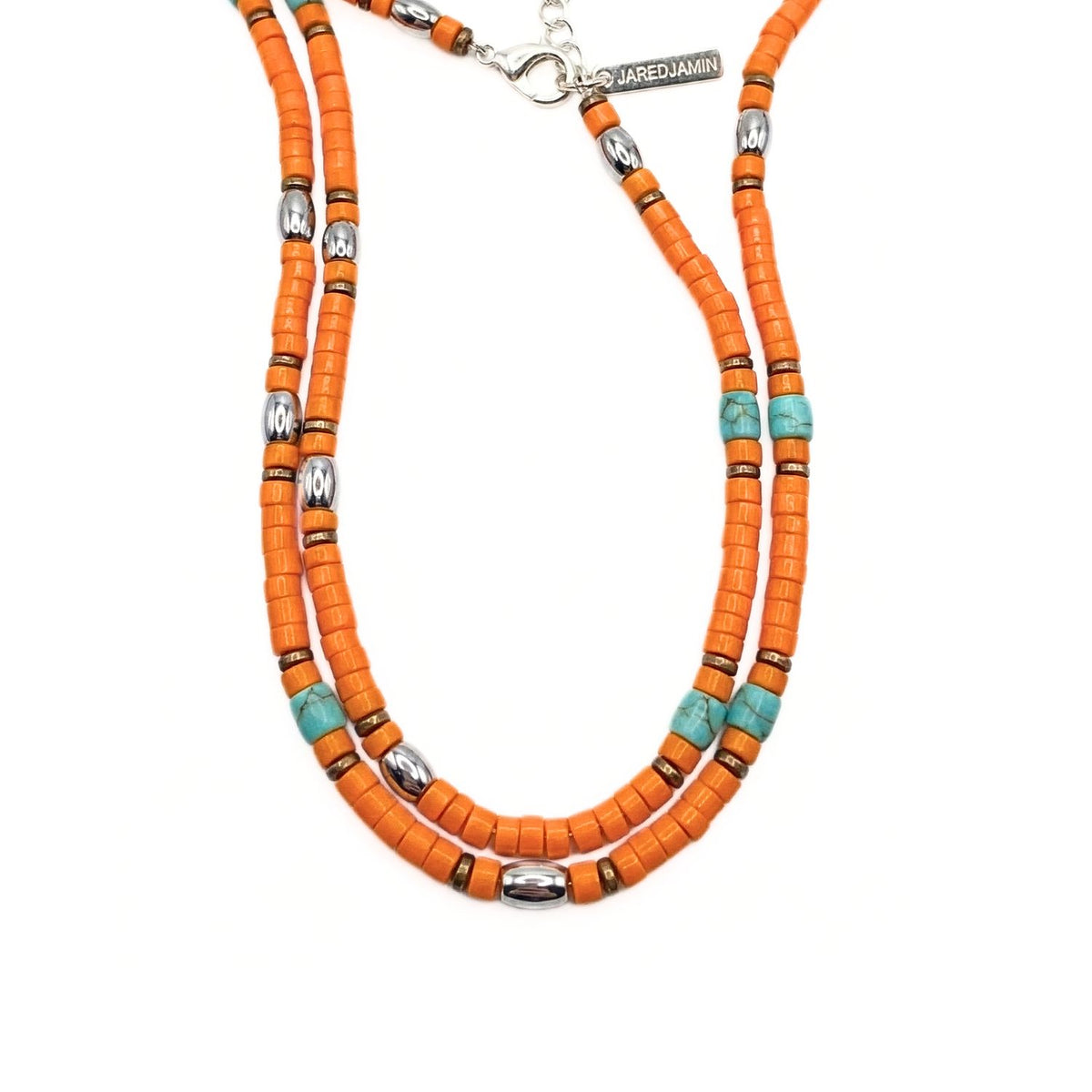 Los Waimea Beaded collar showcases double strands of artisan-crafted orange heishi beads, chalk turquoise, y plata ovals. Made in small batches in West Hollywood, it features a brushed finish, low carbon footprint, y signature engraved tag.