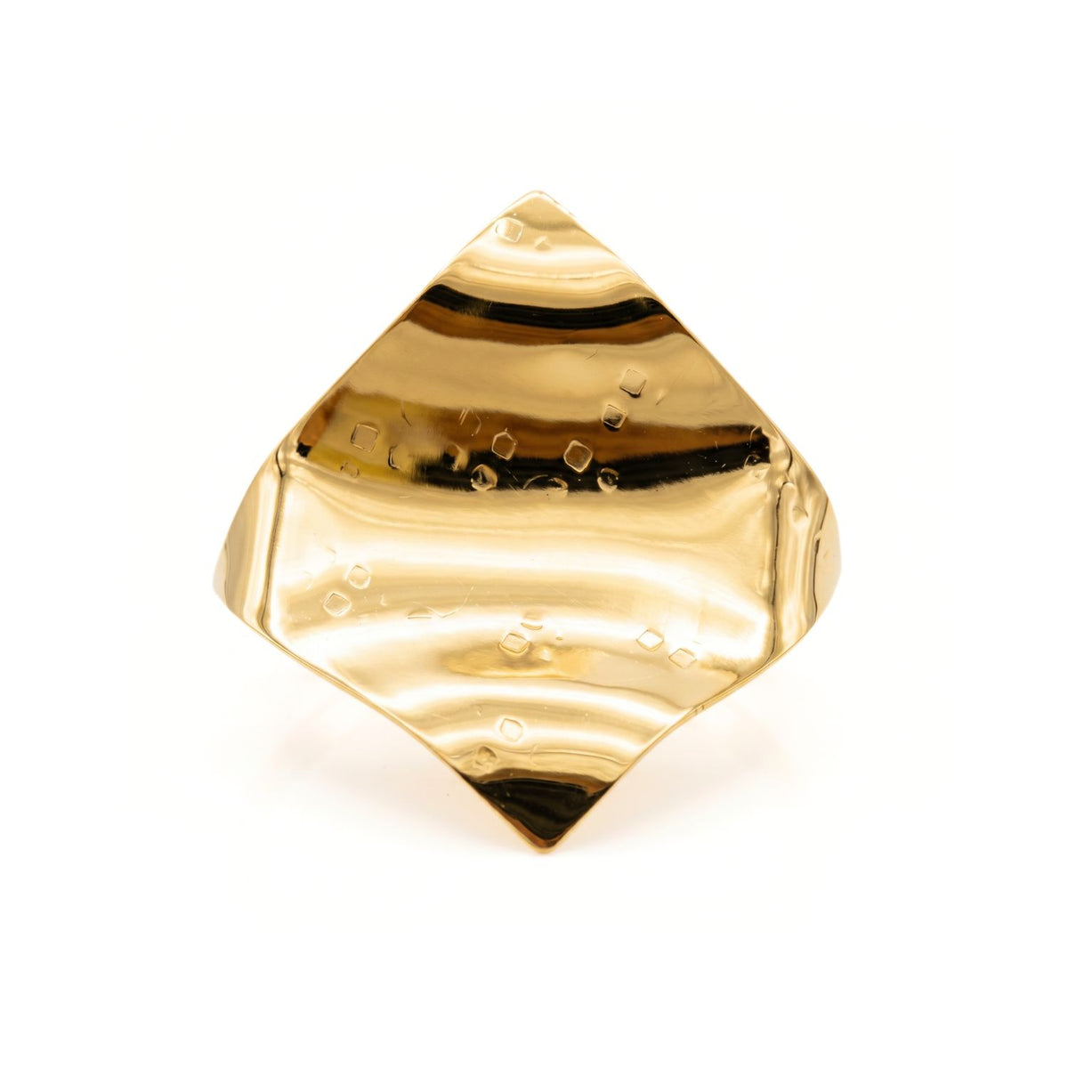 High-resolution studio top view of the JAREDJAMIN Gold Whitney Wave Ring against a clean white backdrop, detailing its 18k gold-plated 66mm rhombus plate, hand-hammered texture, and fluid, fabric-like undulating folds.