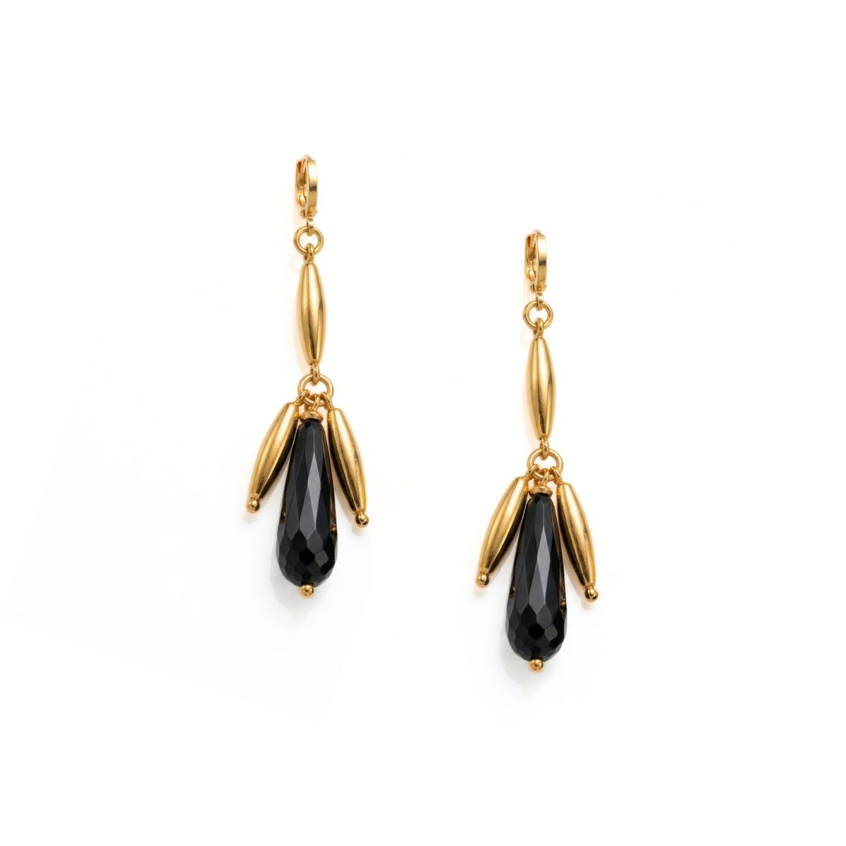 Hand-assembled in our West Hollywood studio, the Wisteria Dangle Leverback Earrings juxtapose oval gold-tone beads with a faceted black teardrop. Crafted in small eco-conscious batches. Style Note: punctuates denim or elevates tailored silk.