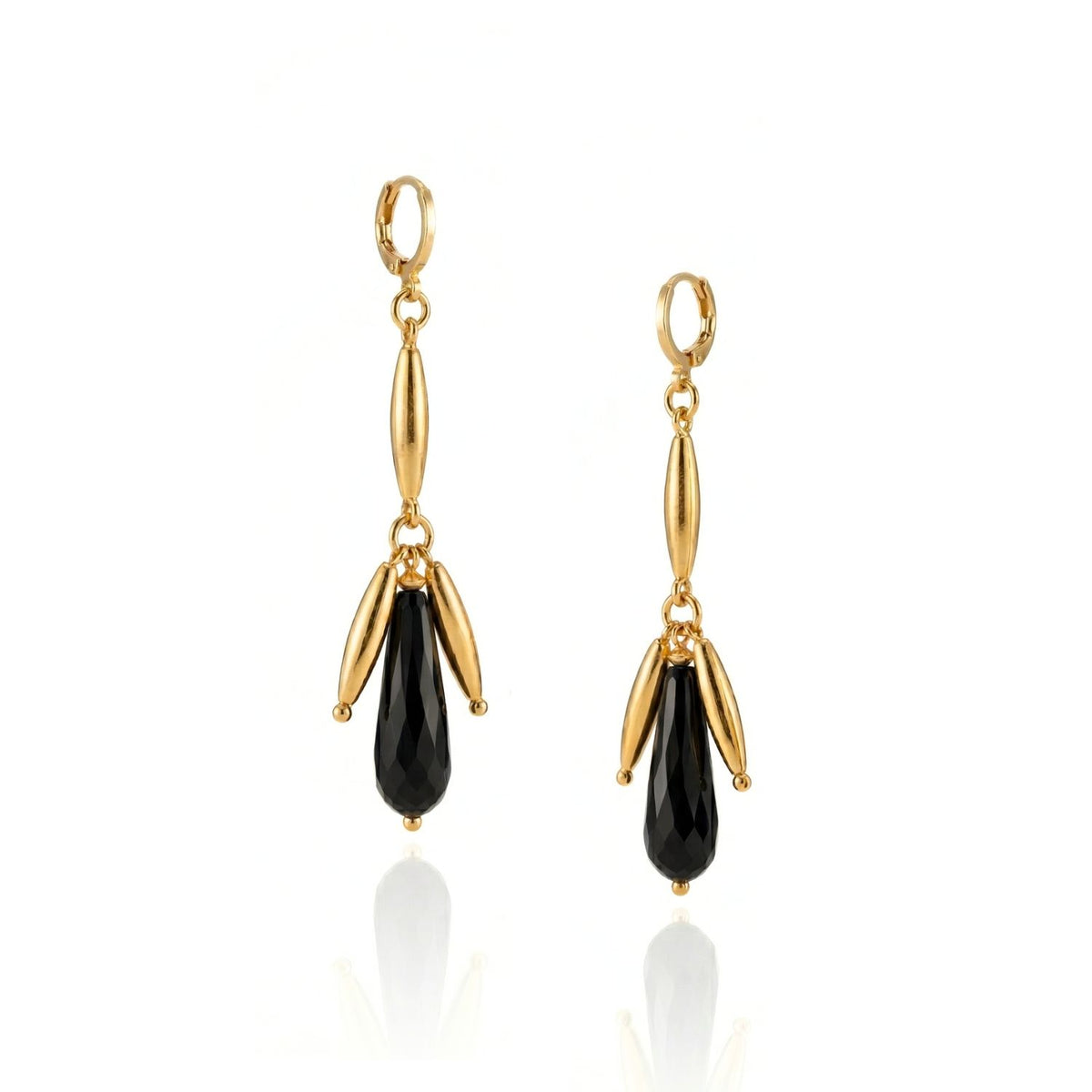 Hand-assembled in our West Hollywood studio, the Wisteria Dangle Leverbacks punctuate with elongated gold-tone beads and onyx-like teardrops. Crafted small-batch with eco-minded intent. Style Note: slips from tailored shirting to after-dark silk.